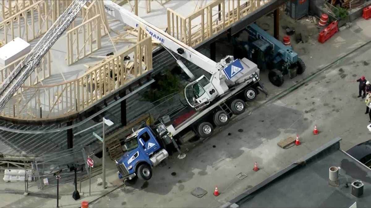 Crane tips, falls on Dorchester construction site