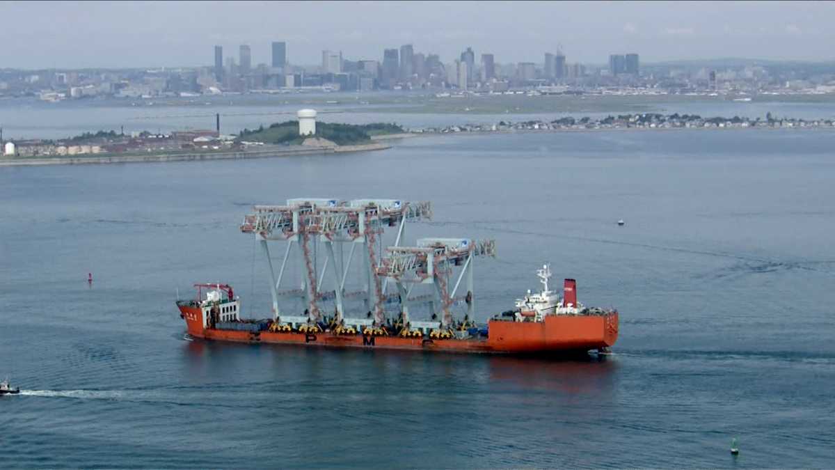 Three enormous new cranes arrive at Boston Harbor