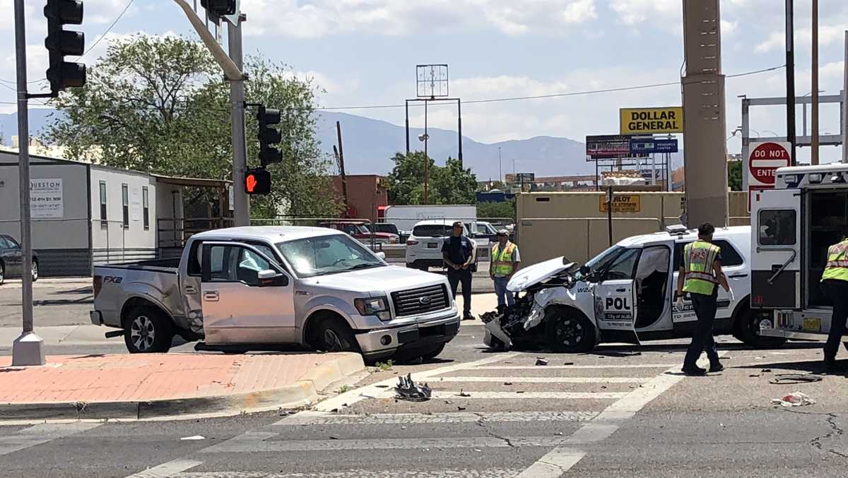 Driver runs red light, crashes into APD officer