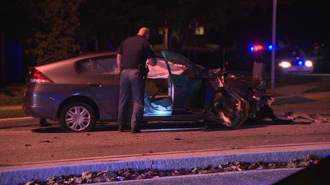 Crash sends car through Calvert Hall fence; 4 injured