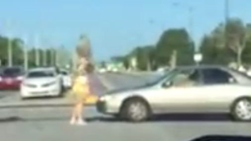 Retired police officer accused of trying to run over crossing guard