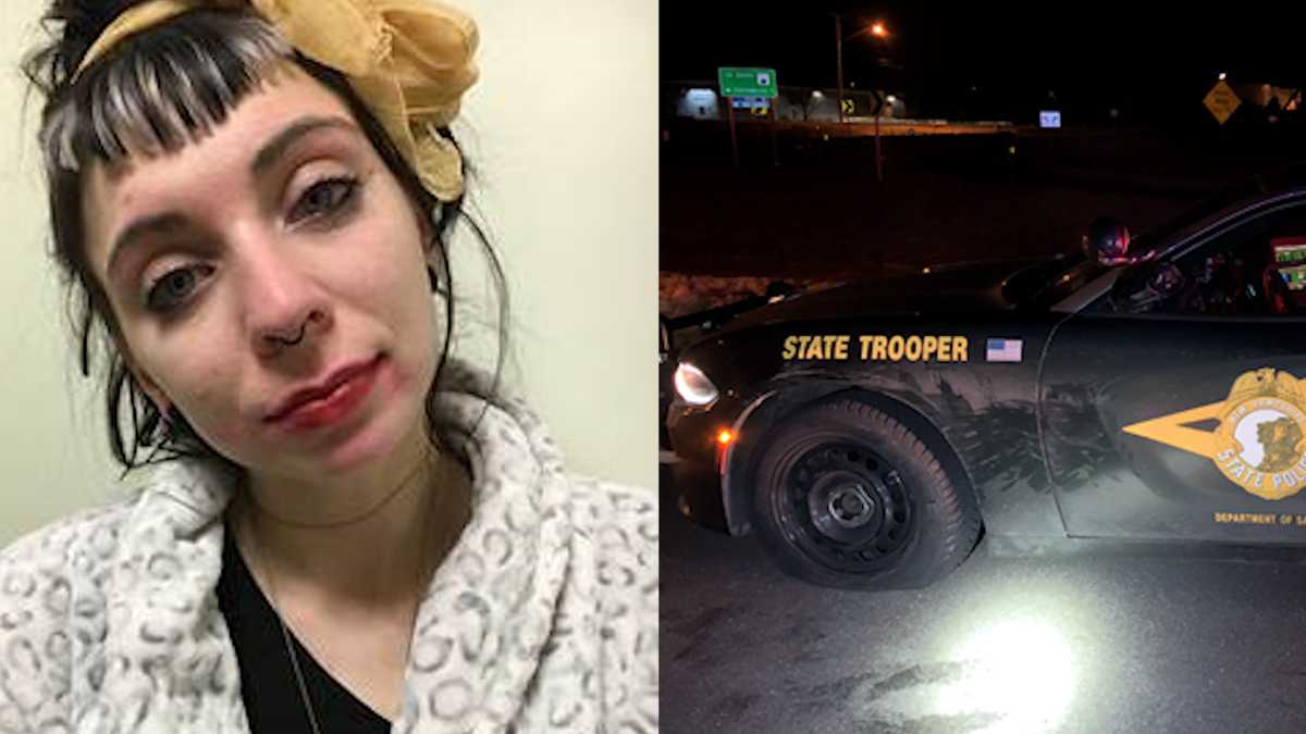 Driver accused of side-swiping police cruiser, tow truck