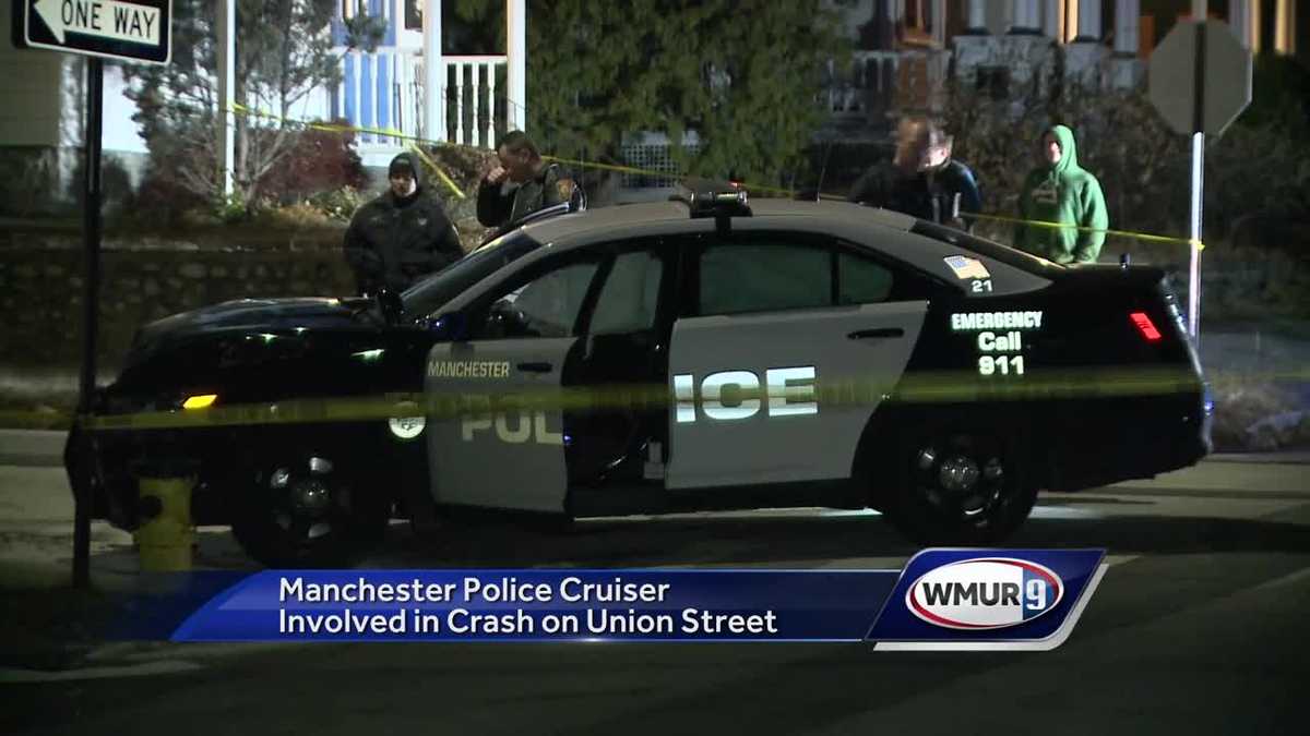 Police cruiser and car collide in Manchester