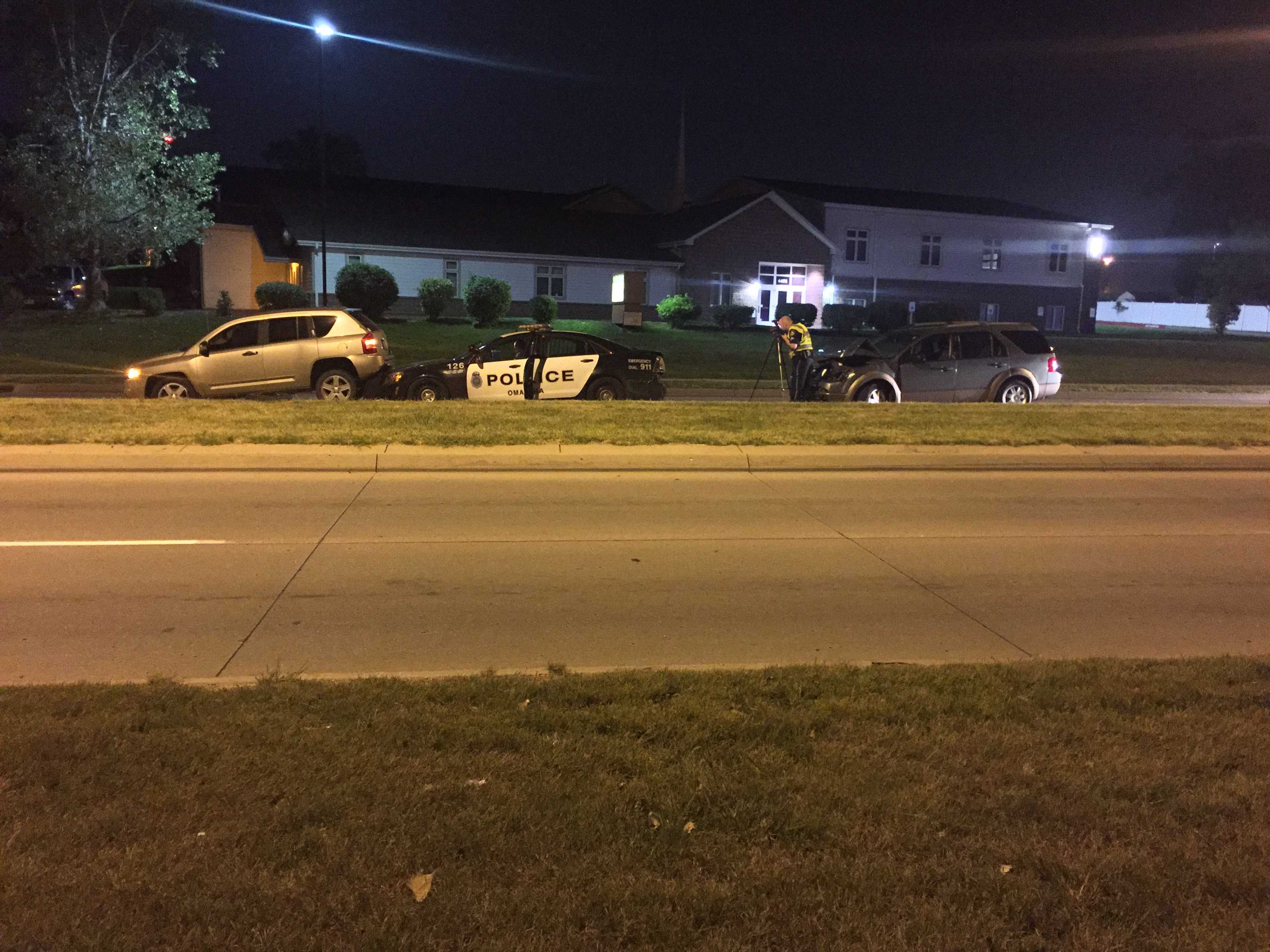 Car Hits Omaha Police Cruiser, Officer Escapes Injury