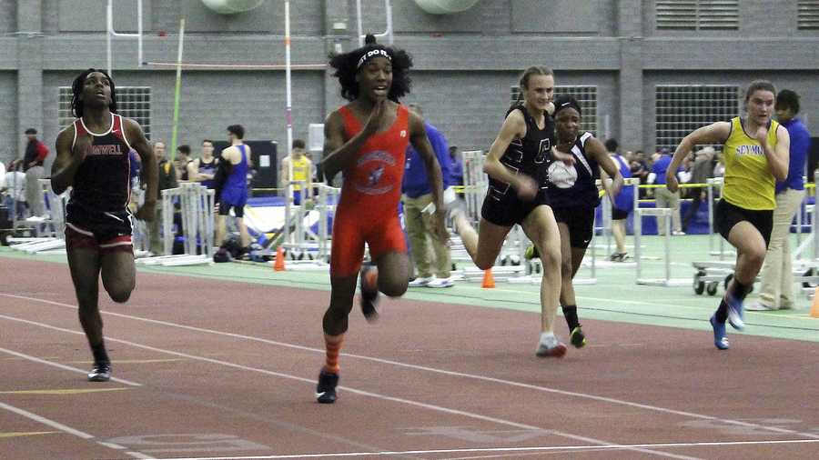 In this Feb. 7, 2019 file photo, Bloomfield High School transgender athlete Terry Miller, second from left, wins the final of the 55-meter dash over transgender athlete Andraya Yearwood, far left, and other runners in the Connecticut girls Class S indoor track meet at Hillhouse High School in New Haven, Conn.