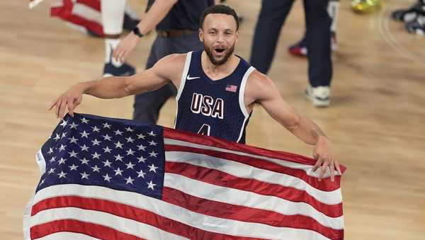 United States' Stephen Curry (4) reacts after winning a men's gold medal basketball game against France at Bercy Arena at the 2024 Summer Olympics, Saturday, Aug. 10, 2024, in Paris, France.