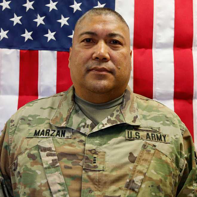 Chief Warrant Officer 3 Robert Marzan was described by his sister as “a strong leader who lived by example,” referring to him as a loving husband, father, brother, uncle and friend.
