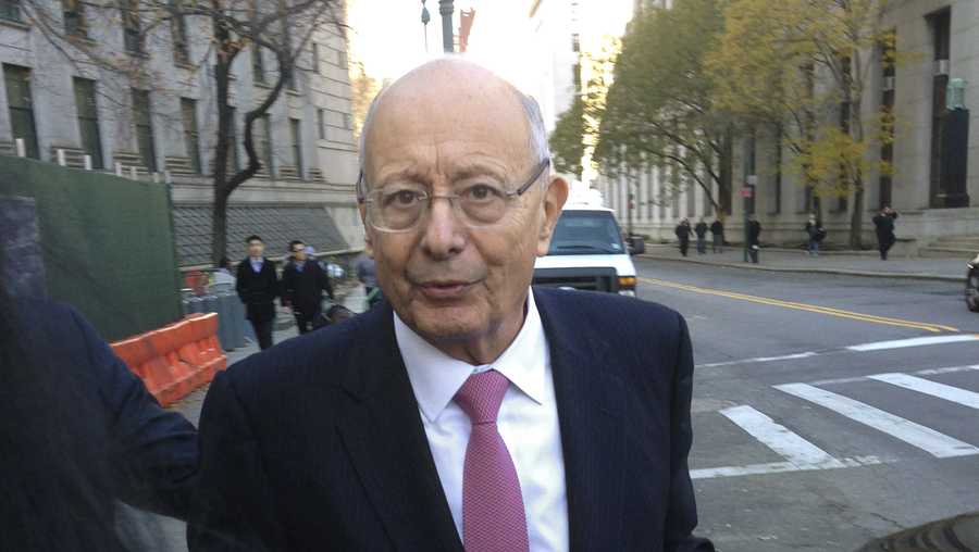 In a Friday, Dec. 4, 2015 file photo, former U.S. Sen. Alfonse D'Amato leaves Manhattan federal court in New York.