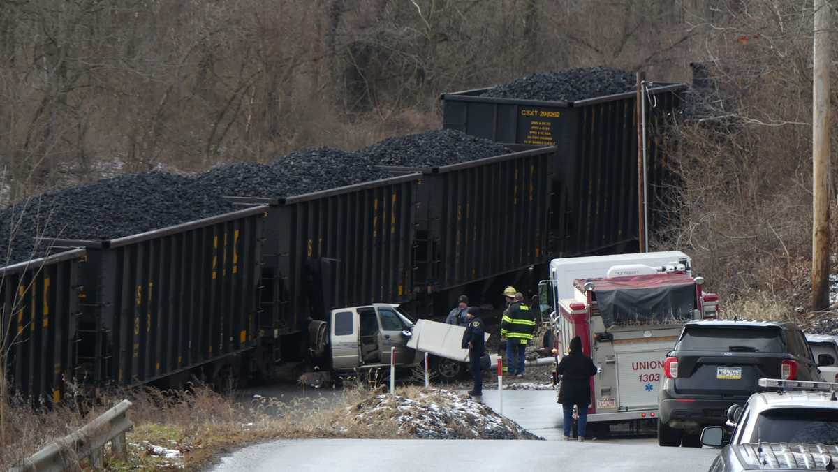 2 injured after truck, train collide in Lawrence County