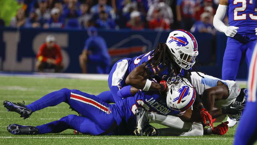 Buffalo Bills cornerback Dane Jackson, bottom, is injured on a play during the first half of an NFL football game against the Tennessee Titans, Monday, Sept. 19, 2022, in Orchard Park, N.Y.