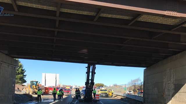 Car collides with microwave thrown from St. John's overpass late