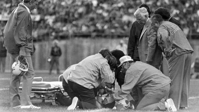Darryl Stingley, a New England Patriots wide receiver, lies on the field  x20;after receiving a hit that paralyzed him during football game at the  Oakland Coliseum in California on Aug. 13, 1978.