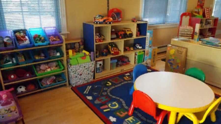 Childcare facility with table and chairs and toys