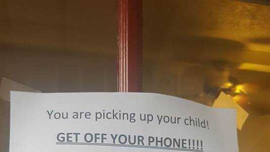 get-off-your-phone-texas-daycare-center-sign-goes-viral