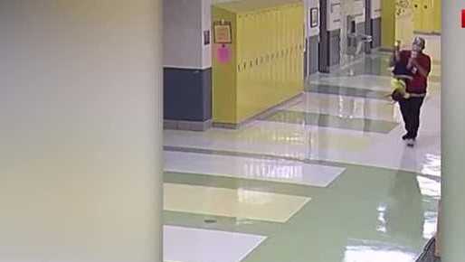 Dayton school employee indicted after being shown on camera hitting ...