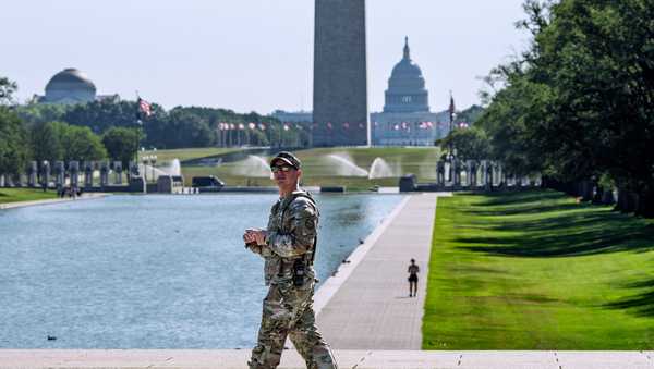 A member of the West Virginia National Guard gazes up at the Lincoln Memorial on the National Mall in Washington, as part of President Donald Trump's order to use federal law enforcement to expel homeless people and rid the nation's capital of violent crime, Monday, Aug. 25, 2025.