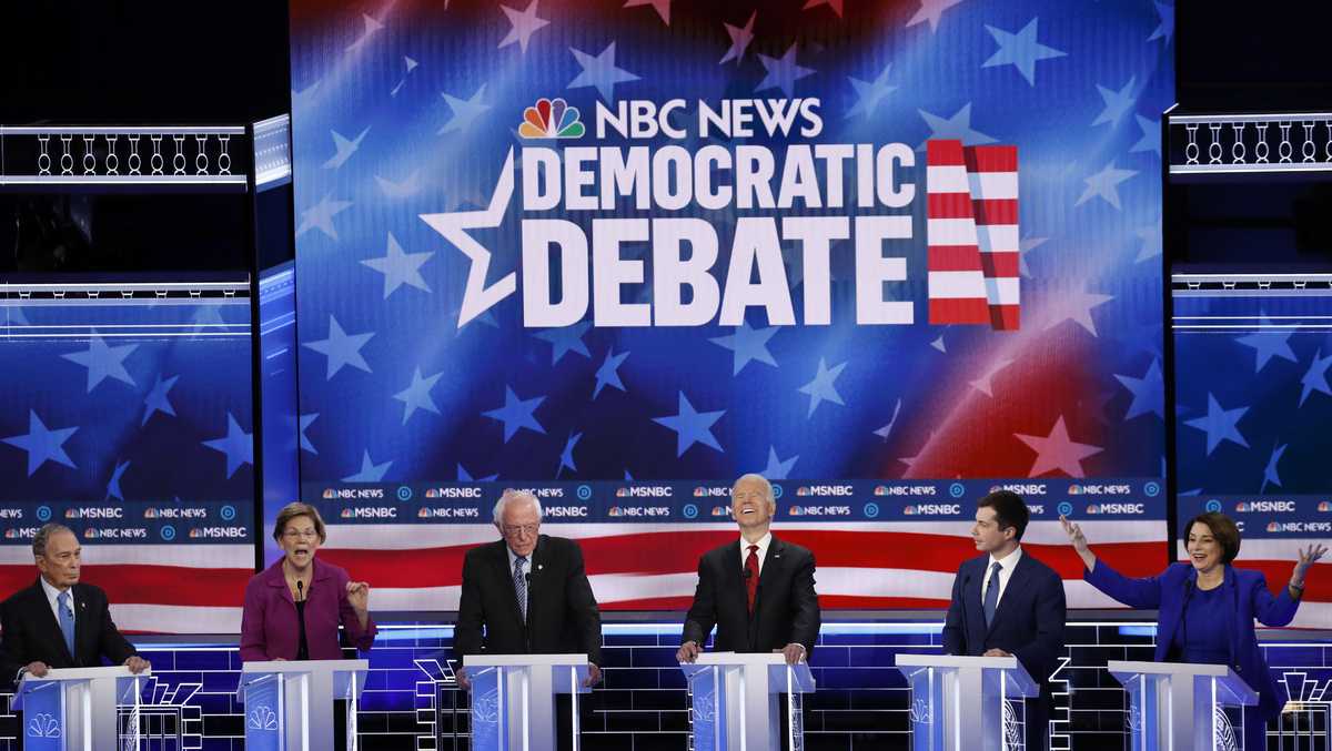 Candidates take shots at Bloomberg in his first appearance on debate stage