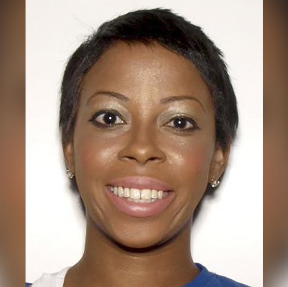 woman wanted for murder after son's body found in luggage