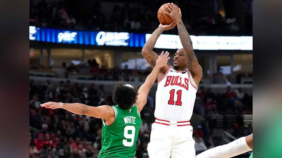 Chicago Bulls' DeMar DeRozan shoots over Boston Celtics' Derrick White during the second half of an NBA basketball game Monday, Oct. 24, 2022, in Chicago. The Bulls won 120-102.