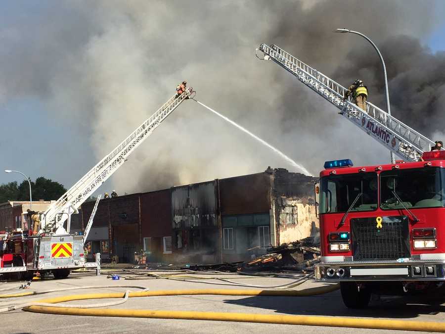 Photos: Exira fire destroys four businesses, damages surrounding area