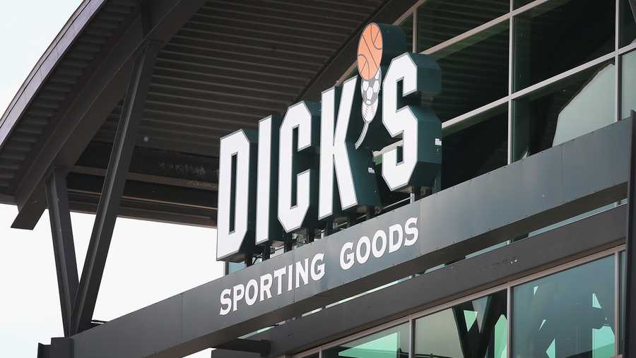 A sign with the company logo hangs above the entrance of a Dick's Sporting Goods store on May 20, 2014 in Niles, Illinois. Dicks Sporting Goods stock price plummeted more than 17% during mid-day trading today following a weaker than expected earnings announcement.