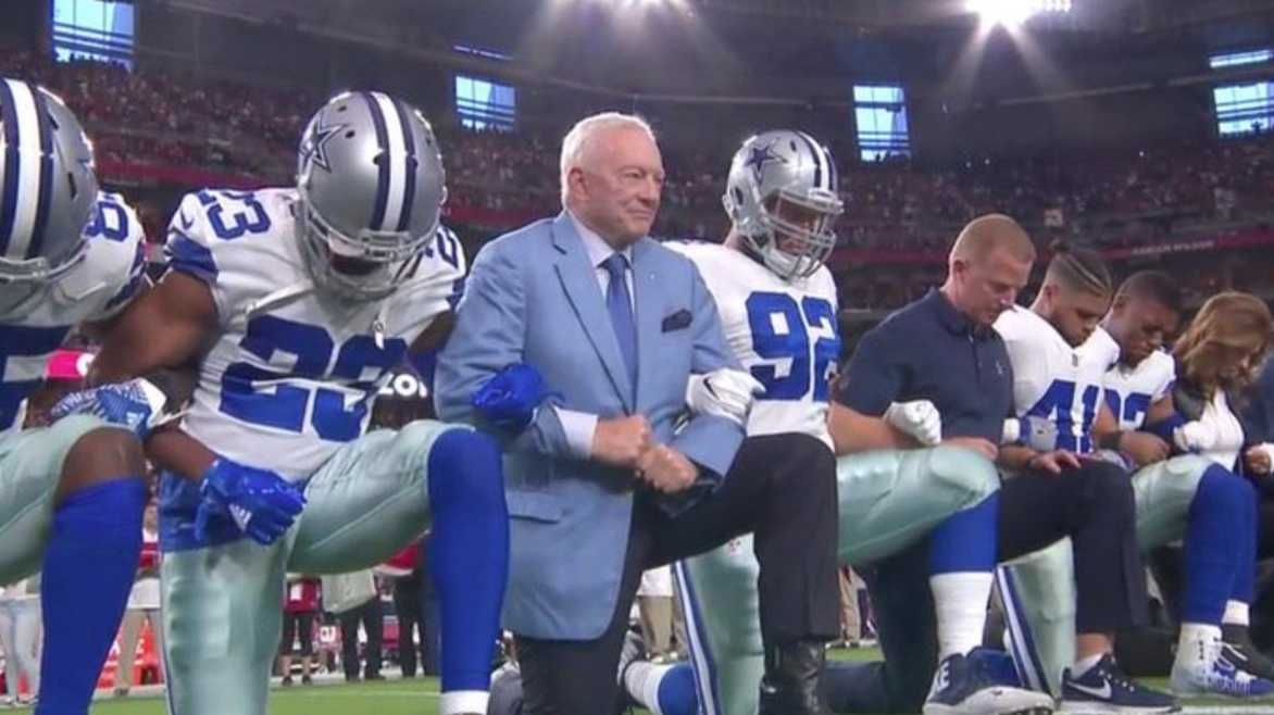 NFL players lock arms in national anthem at Cowboys-Cardinals game