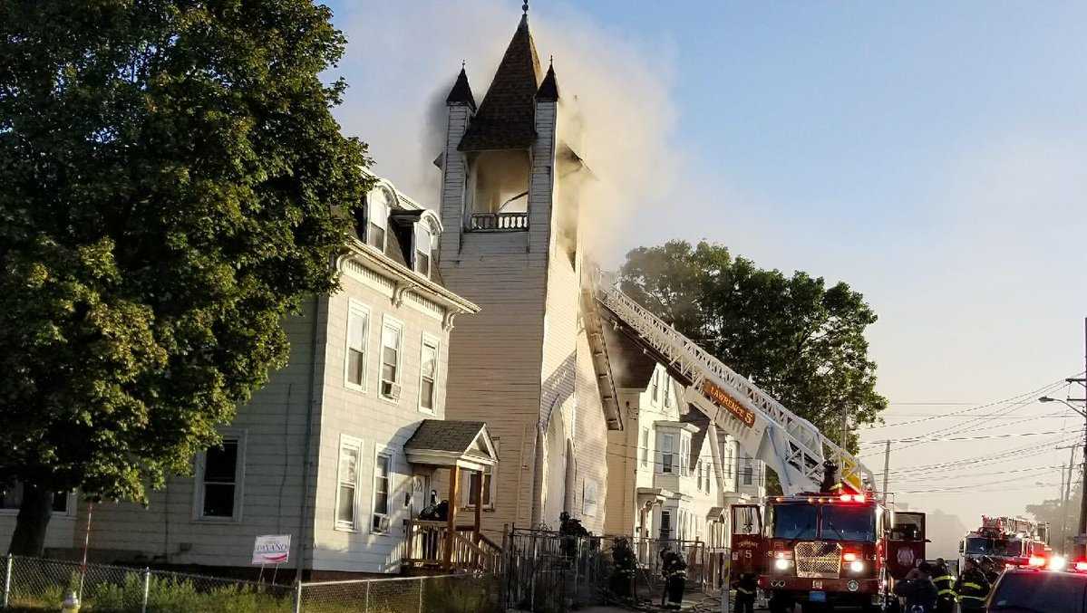 Crews battle fire in Lawrence church