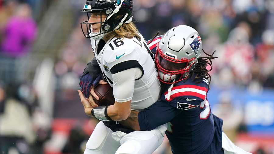 New England Patriots outside linebacker Dont'a Hightower, right, sacks Jacksonville Jaguars quarterback Trevor Lawrence (16) during the first half of an NFL football game, Sunday, Jan. 2, 2022, in Foxborough, Mass. (AP Photo)