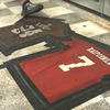 Bar makes doormat out of Marshawn Lynch, Kaepernick jerseys