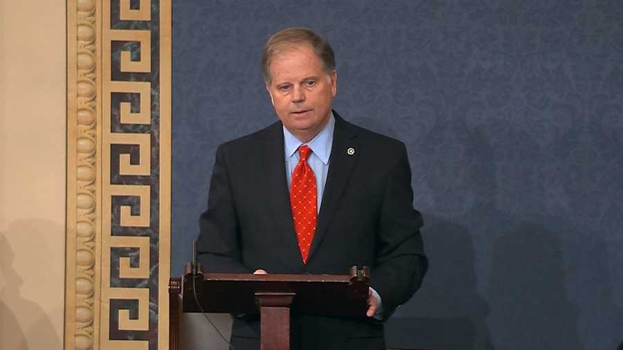 Senator Doug Jones voting to convict President Trump