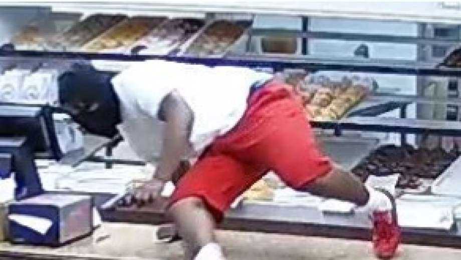 Sympathetic suspect apologized as he robbed doughnut shop, police say