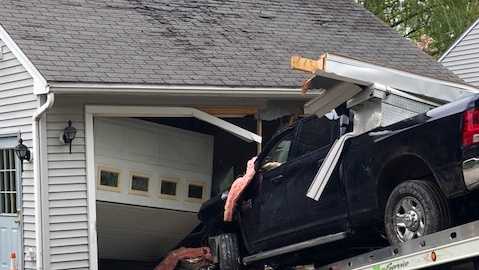 Man hospitalized after crashing into house in Dover
