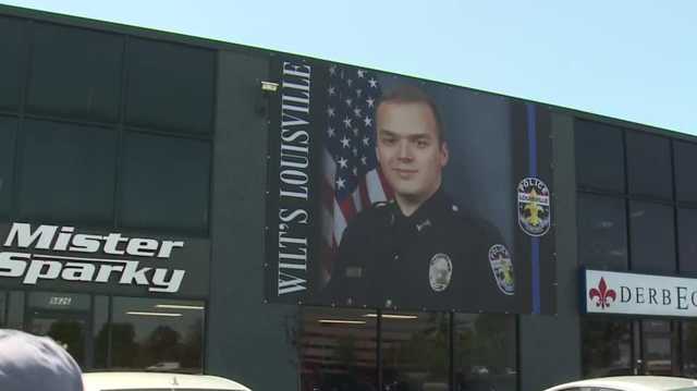 'Wilt's Louisville' banner honors rookie officer hurt in shooting - Vimarsana News