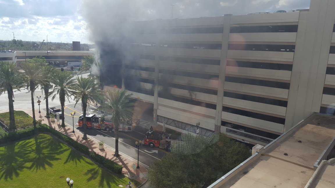 Car fires send smoke billowing over downtown Orlando
