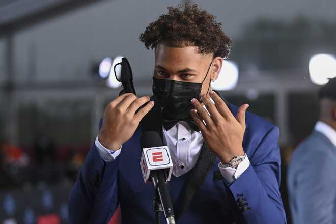 North&#x20;Dakota&#x20;State&#x20;quarterback&#x20;Trey&#x20;Lance&#x20;appears&#x20;on&#x20;the&#x20;red&#x20;carpet&#x20;at&#x20;the&#x20;Rock&#x20;&amp;&#x20;Roll&#x20;Hall&#x20;of&#x20;Fame&#x20;before&#x20;the&#x20;NFL&#x20;football&#x20;draft&#x20;Thursday,&#x20;April&#x20;29,&#x20;2021,&#x20;in&#x20;Cleveland.