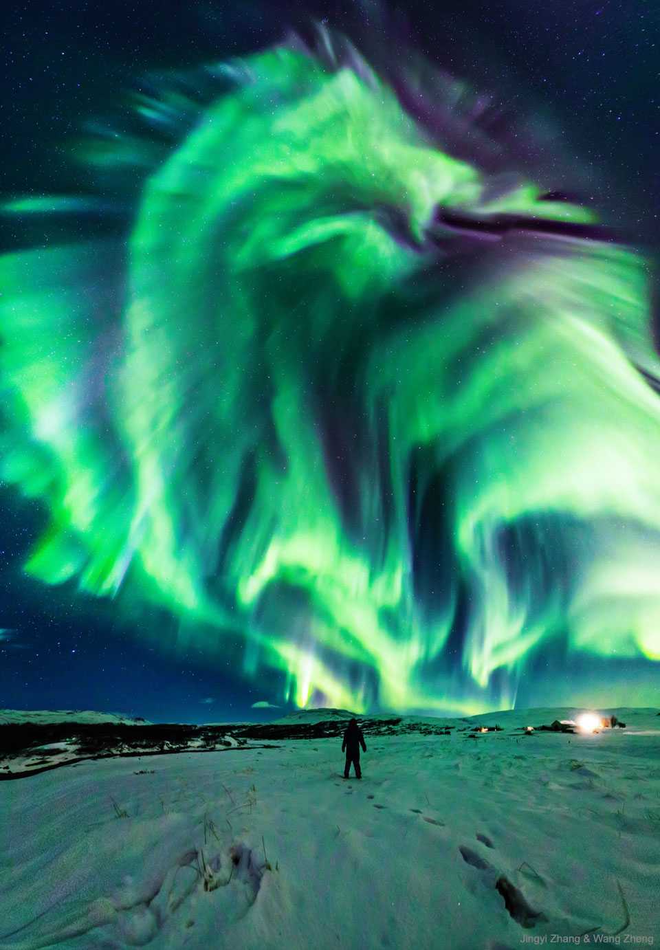 Brilliant aurora borealis appears as fire-breathing dragon over
