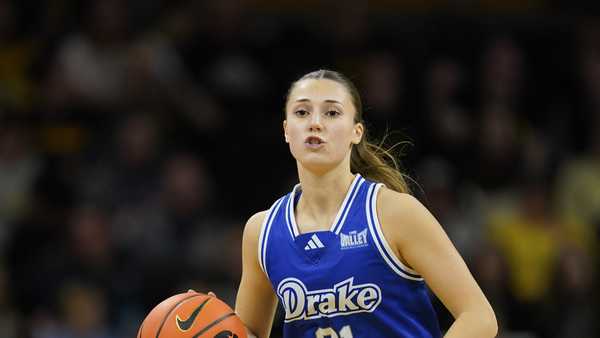 Drake guard Ava Hawthorne (21) drives up court during an NCAA college basketball game against Iowa, Sunday, Nov. 19, 2023, in Iowa City, Iowa. (AP Photo/Charlie Neibergall)