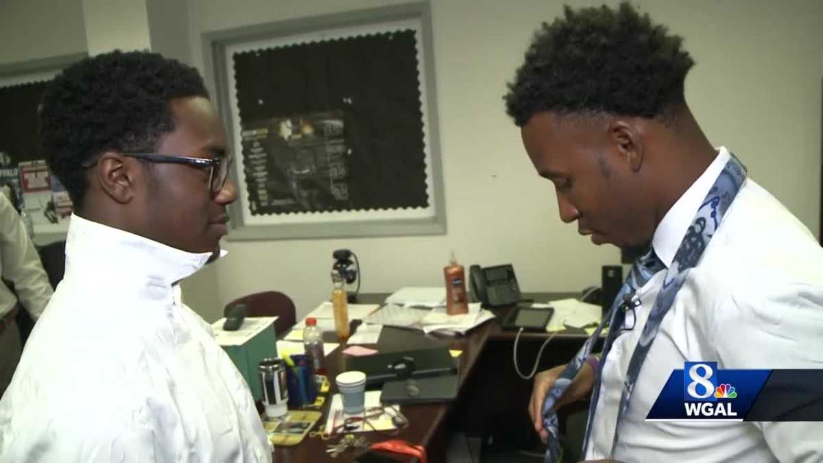 Football team dresses for success