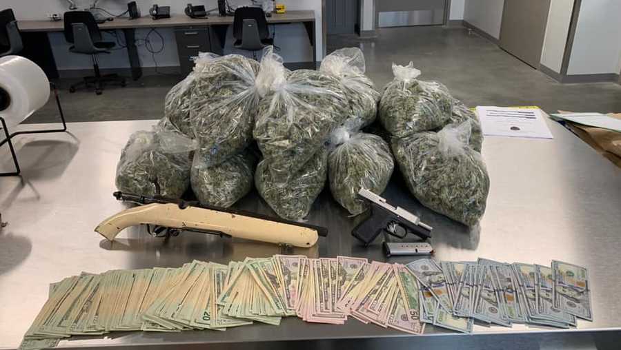 Drugs, guns and money seized during a Salinas Police Department search.
