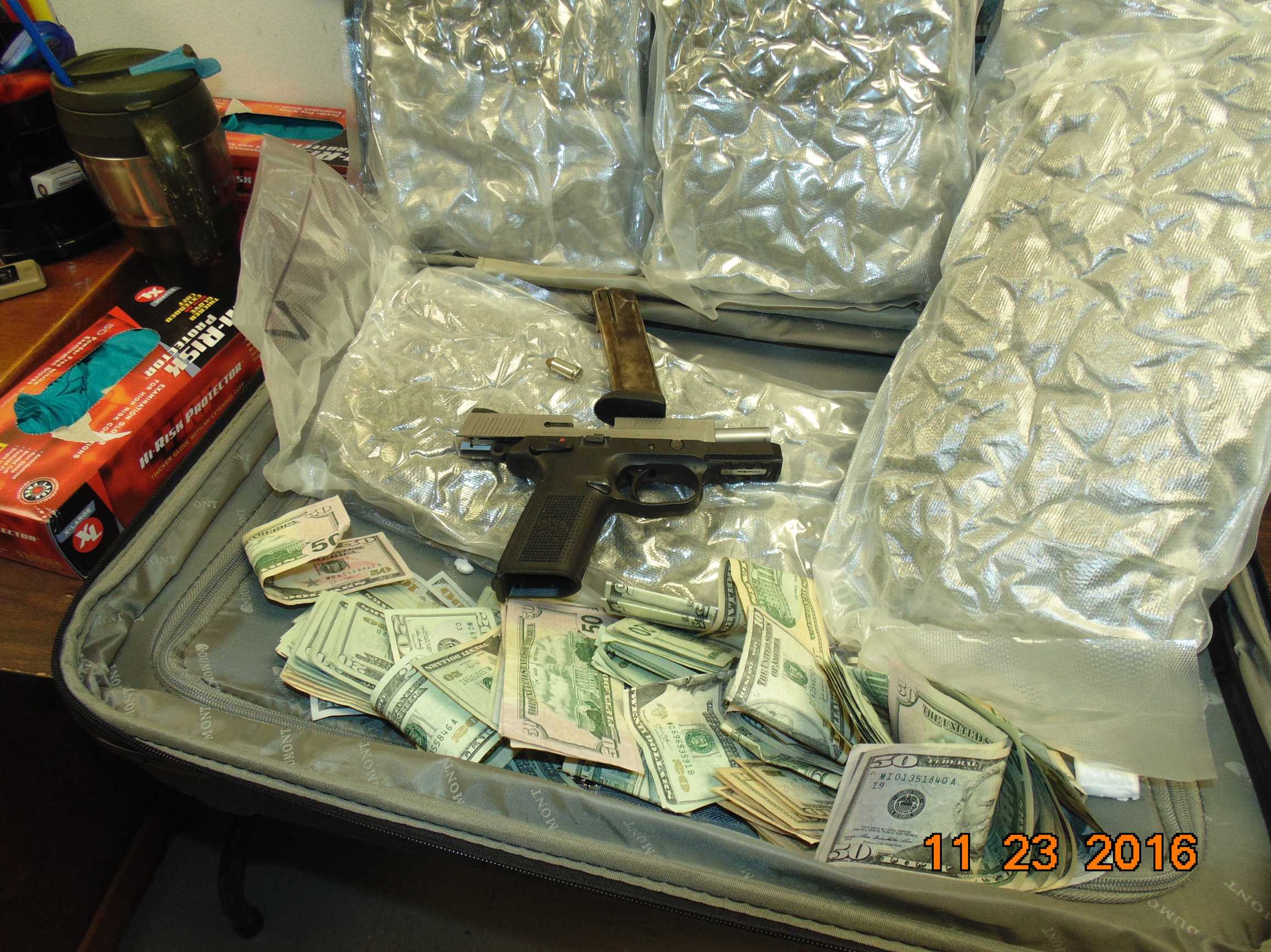 PHOTOS: Guns, Drugs, Cash Seized In Hamilton County