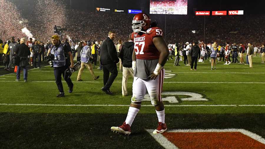 Oklahoma defensive tackle Du'Vonta Lampkin leaves the field after Oklahoma lost to Georgia 54-48 in overtime in the Rose Bowl NCAA college football game Monday, Jan. 1, 2018, in Pasadena, Calif. (AP Photo/Mark J. Terrill)