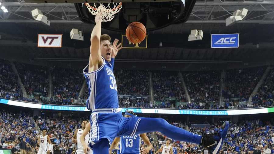 duke center kyle filipowski (30) dunks against virginia during the second half of an ncaa college basketball game for the championship of the atlantic coast conference tournament in greensboro, n.c., saturday, march 11, 2023.