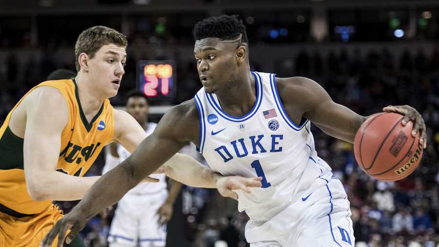 Duke forward Zion Williamson (1) drives against North Dakota State forward Rocky Kreuser, left, during the first half of a first-round game in the NCAA men’s college basketball tournament Friday, March 22, 2019, in Columbia, S.C. 
