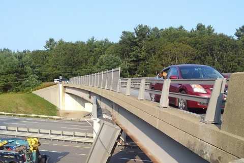 Dump truck slams into overpass on Maine Turnpike