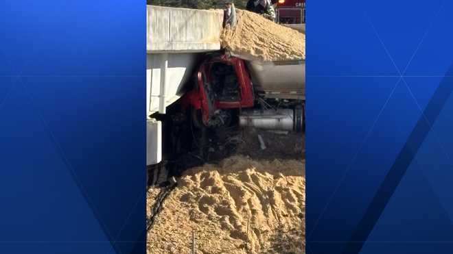 Dump truck crashes into Upstate bridge, fire chief says