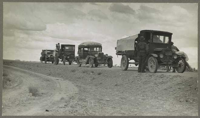 A group of people traveling in New Mexico during the Dust Bowl.