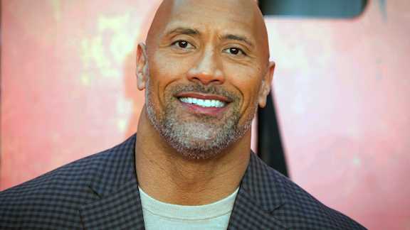 FILE - A summit that included a star-studded virtual concert hosted by Dwayne Johnson has raised nearly $7 billion in cash and loan guarantees to assist the poor around the globe whose lives have been upended by the coronavirus pandemic.