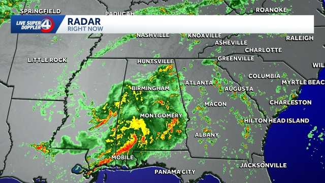 What was Arthur, moves inland, bringing flooding, tornado threats