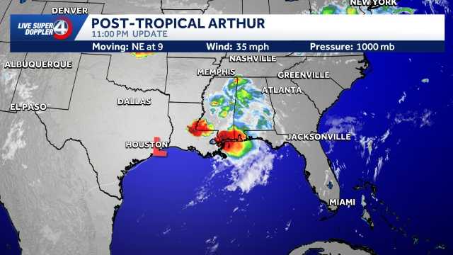 What was Arthur moves inland, bringing flooding, tornado threats