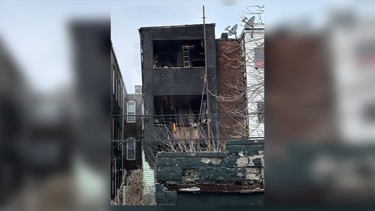 Crews battle heavy flames, ice in East Boston multifamily fire